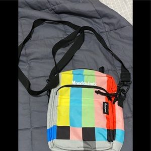 Moodswings broadcast crossbody bag